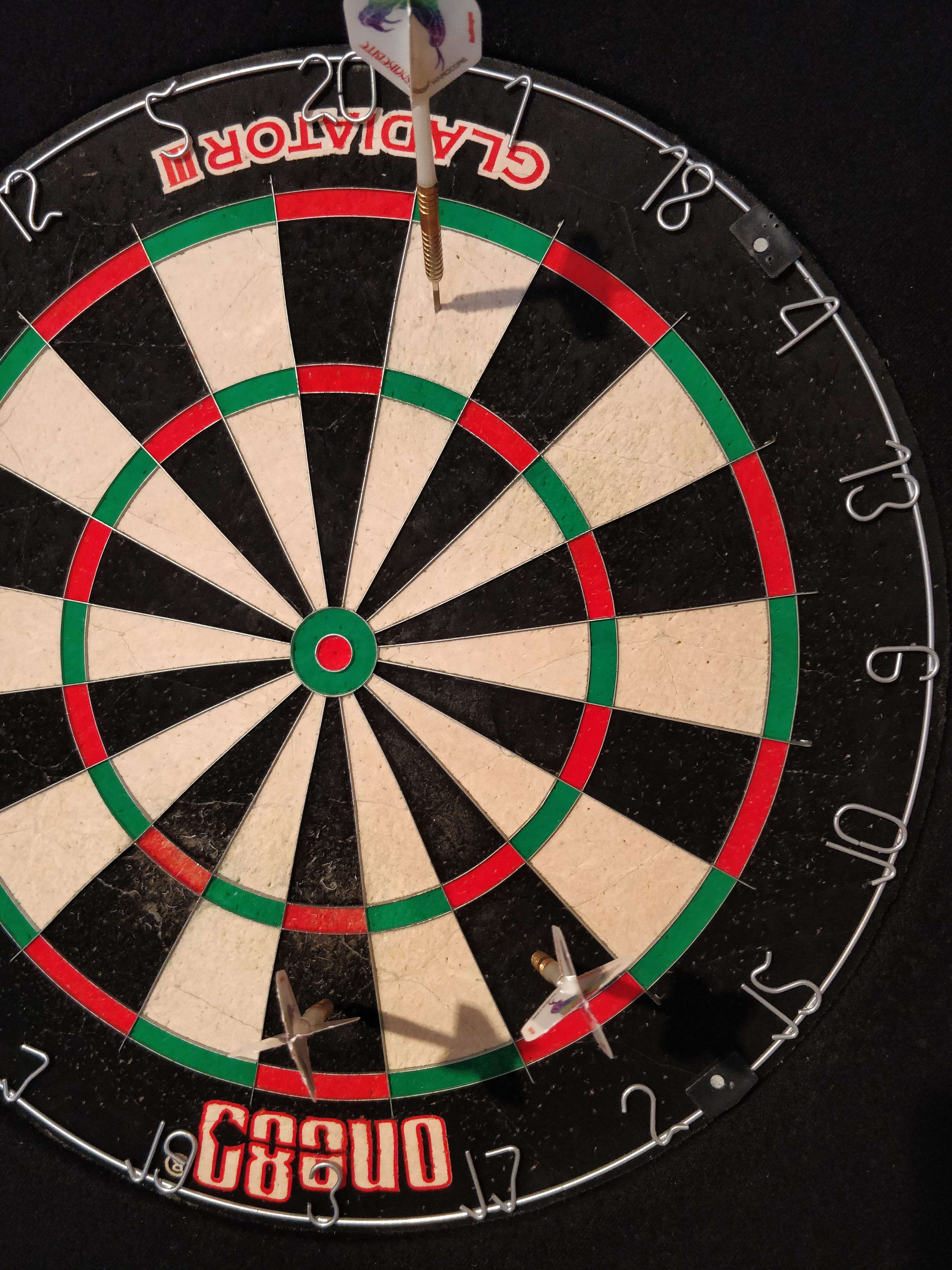 Darts in Dartscheibe